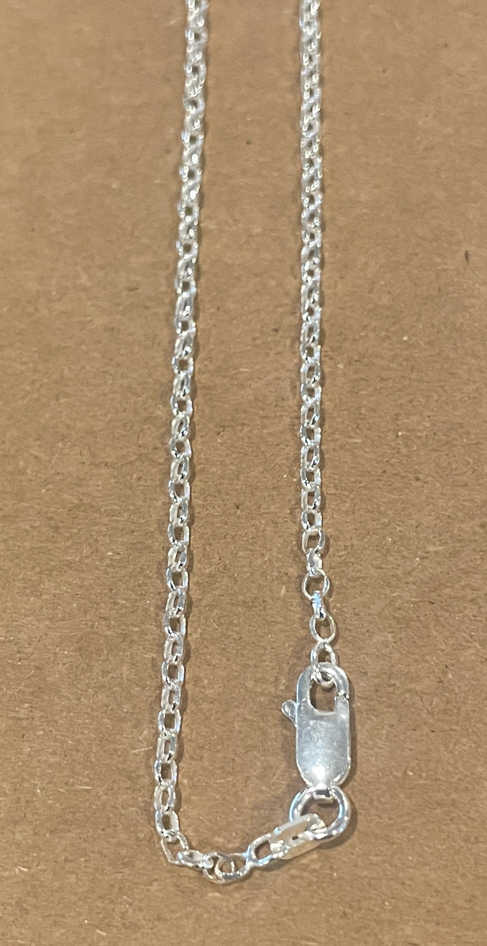 18in, 2mm DMND cut rolo sterling silver chain. Chain made in Italy. 
